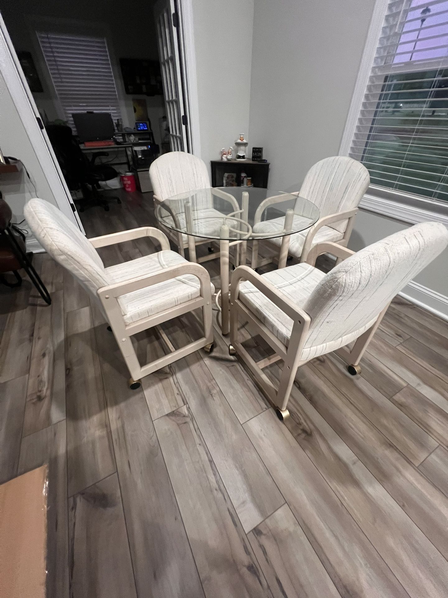 Moving Sale – Glass Dining Table w/ 4 Rolling Chairs – Must Go!