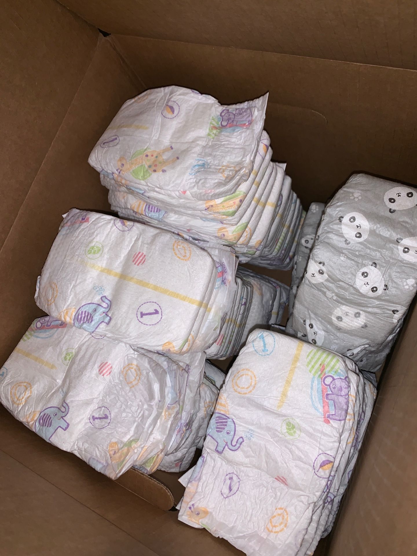 Diapers size 1 and Newborn