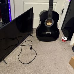 TV and Guitar