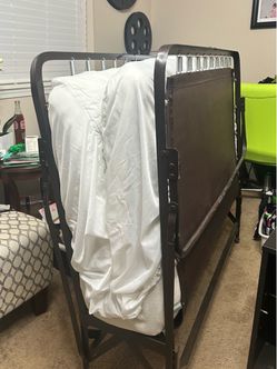 Queen size roller away bed