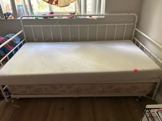 White trundle bed with one mattress