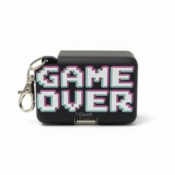 Gems Novelty USB-A wall charger Figural "GAME OVER" Keychain New Sealed Package. This item is a GEMS Figural Keychain Wall Charger with a "Game Over" 