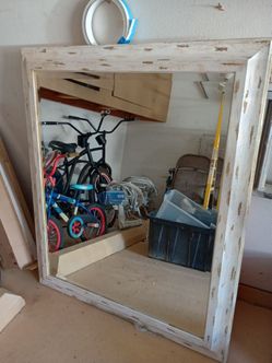 Big wall mirror with wood frame
