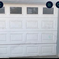 $REDUCED$ Pair roll up aluminum garage doors