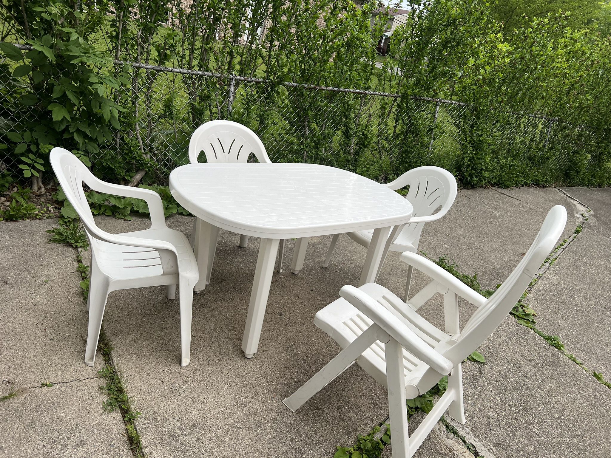 5 Pieces: Outdoor Table + 3 White Chairs + Adjustable Back Foldable Chair β $65 Total