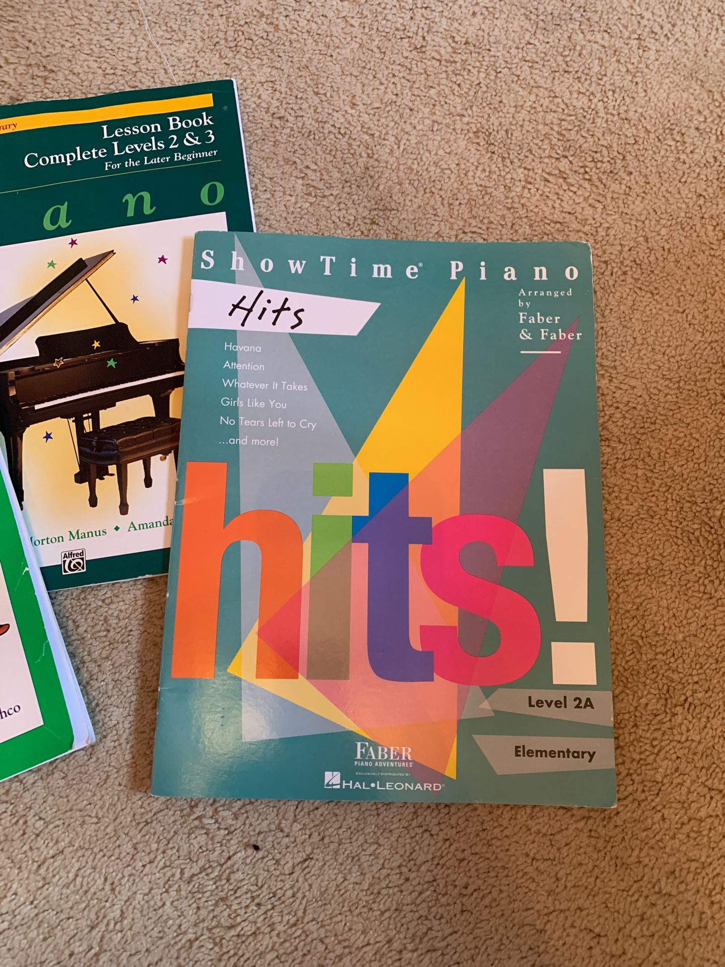 Alfred’ Basic Piano lesson books and Hits book