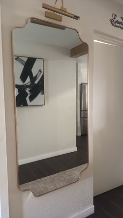 Gold frame wall mirror