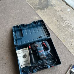 Bosch 8 Amp 1-1/8 in. Corded Variable Speed SDS-Plus Concrete/Masonry Rotary Hammer Drill with Depth Gauge and Carrying Case
