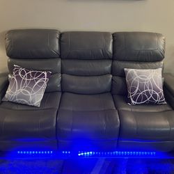 Grey leather glowing sofa , 2 Roll Out Carpet , 2 Corner  Tables 