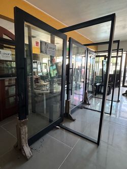 3-Black Aluminum clad  Glass Pivote doors 53x90