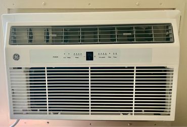 Air conditioner GE 10000 BUT  WALL SLEEVE  BRAND NEW