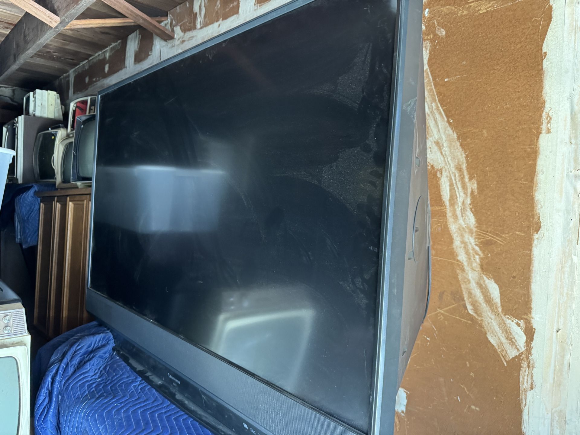 Vintage Mitsubishi Projection Television TV This is a vintage Mitsubishi projection television that measures 65” x 26” x 43” with a screen size of ab