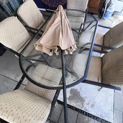 Patio Table Set w/ 6 Cushioned Chairs + Solar Light Umbrella