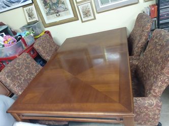 Dining room table and six matching chairs