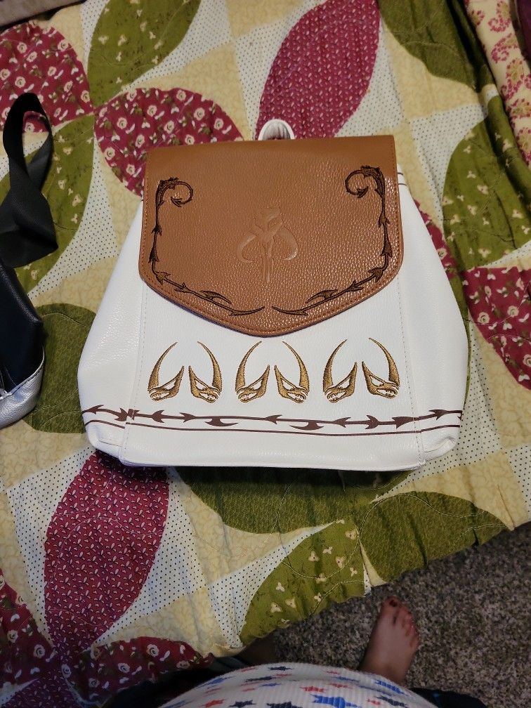A Danielle Nicole STAR WARS backpack And Matching Wallet And A Star Wars Baby Yoda Backpack