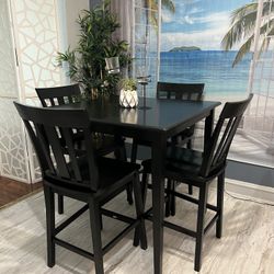 Nice Height Dining Set Good Condition!! Table With 4 Chairs. Table has Some marks.I can Deliver