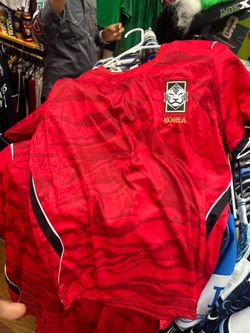 Two small replica korea jersey and shorts. Two sets
