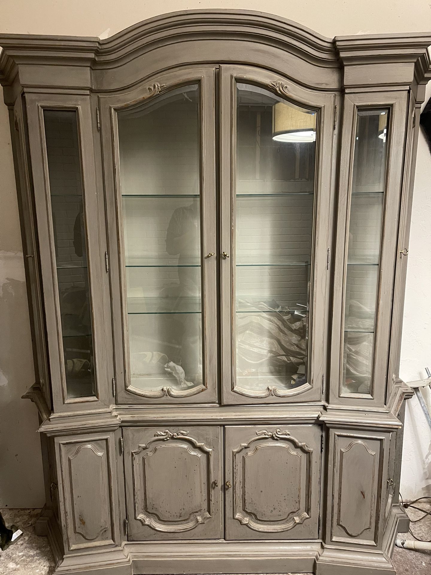 Beautiful professionally repainted Grey and waxed cabinet. Lighted. Great condition.