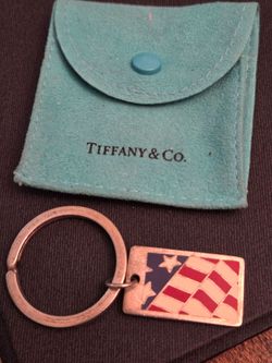 Tiffany and Company sterling silver American flag keychain.