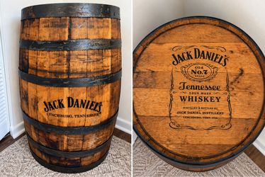 Jack Daniel’s whiskey barrel  36” tall × 22” wide.