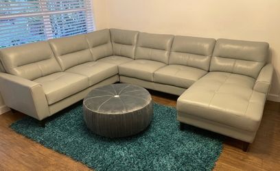 Light green/ aqua leather couch