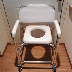 New rolling toilet chair & commode