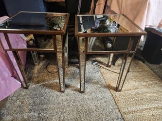 Two glass mirror end tables