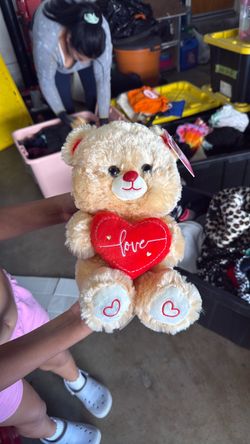 Light orange stuffed bear.