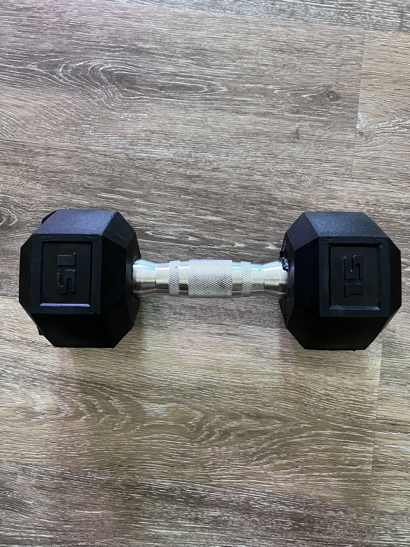 A Set Of 10 & 15 Lb Weights