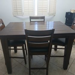 High Dark Wood Dining Table With 4 Chairs