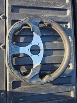 Unbranded carbon fiber look steering wheel