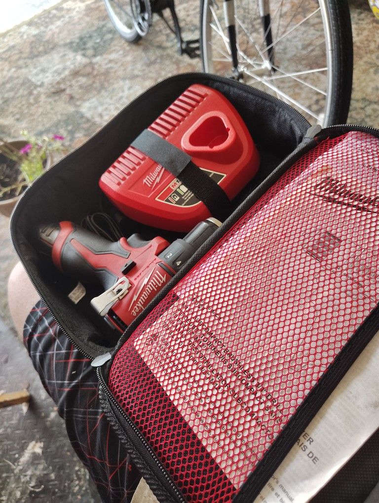 Brandnew miwalkwee drill. batter charger n batterymost compact drill they make