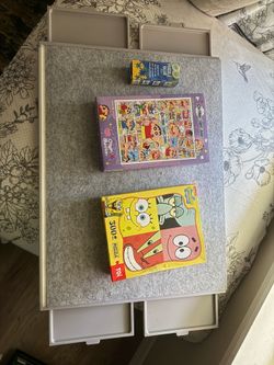 Puzzle board and brand new puzzles