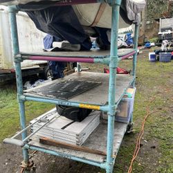 Huge All Metal Tubing Shelf With Wheels.