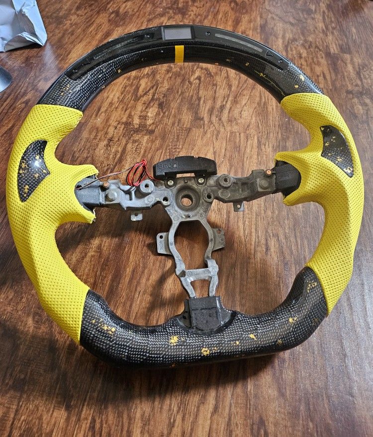 370z Custom Steering wheel with honeycomb carbon fiber with gold flakes and LED Display
