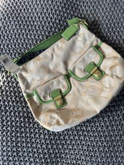 Coach Daisy Signature Pocket Hobo handbag