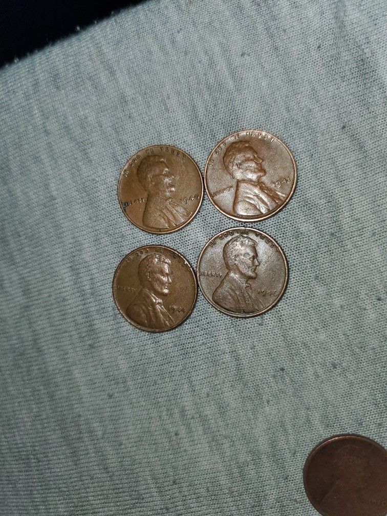 Four Different Variety Date Lincoln Wheat Penny's.
