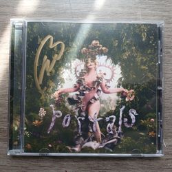 Hand signed Melanie Martinez CD