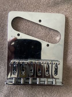 Telecaster replacement bridge & saddles in new condition, never used. 