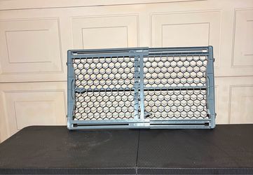 Expandable Plastic Baby Gate 42-in x 23-in Pressure Mounted Gray Plastic Safety Gate