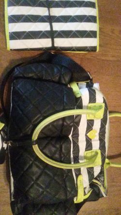 Betsy Johnson diaper bag with changing pad.