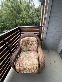 Wicker Outdoor Armchair with Floral Cushions