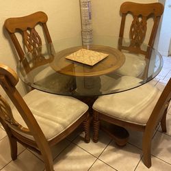 ROUND GLASS TABLE WITH 4 CHAIRS (PINEAPPLE WOOD DESIGN) OBO 
