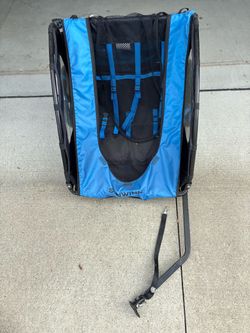 Schwinn 2 passenger Two-passenger bike trailer easily attaches to most bikes with included universal trailer coupler