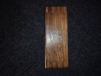 Antique wooden box with 5 point star