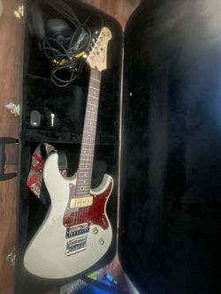 Electric Guitar with Hard Case and amp