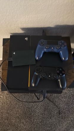 PS4 Console with Two Controllers