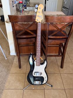 Fender P-bass MIM with several upgrades check out the pics.  This has no batteries. Does not need batteries.  I have this Made in Mexico passive (no b