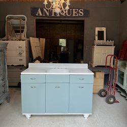 Double Drainboard Sink And Metal Cabinet
