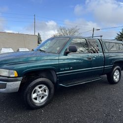 1998 Dodge Ram 1500 Quad Cab 4x4 Pickup 	•	V8 Engine 	•	4WD 	•	247k Miles 	•	New Front Brakes 	•	Clean, Well-Kept Truck 	•	Nice Interior 	•	Runs and d